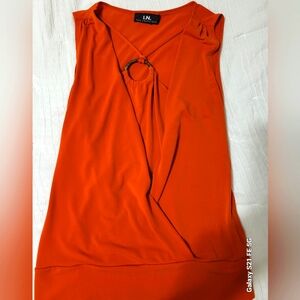 Sleeveless blouse Sz L